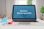 Laptop mit Anzeige Außensteuergesetz